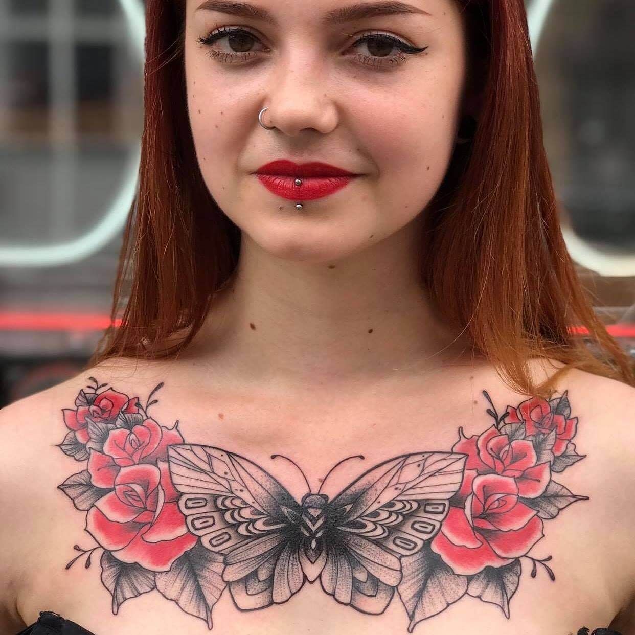 Happy client showing chest tattoo at Thundercat Tattoo Studio Nottingham